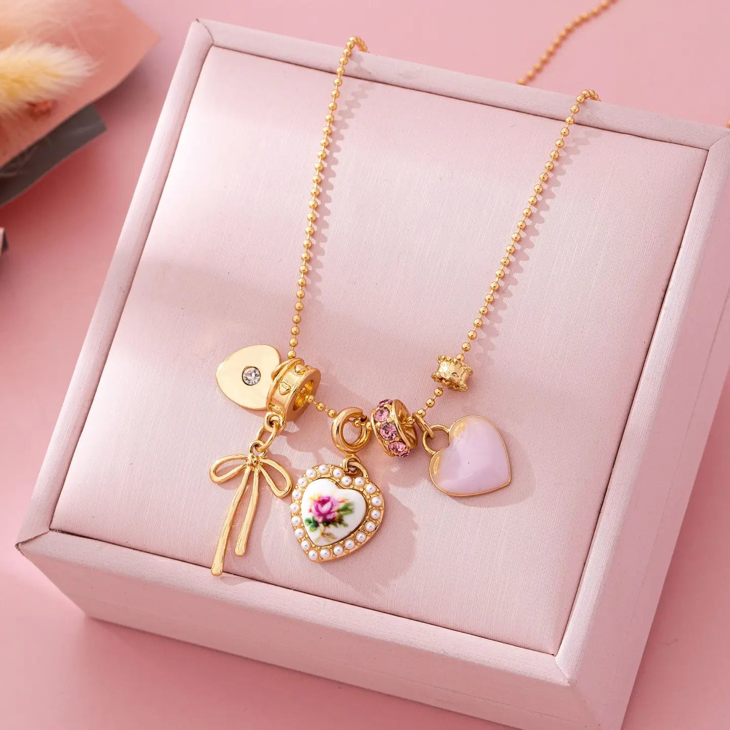 Multi Charm Porcelain Bow Ball Chain Necklace