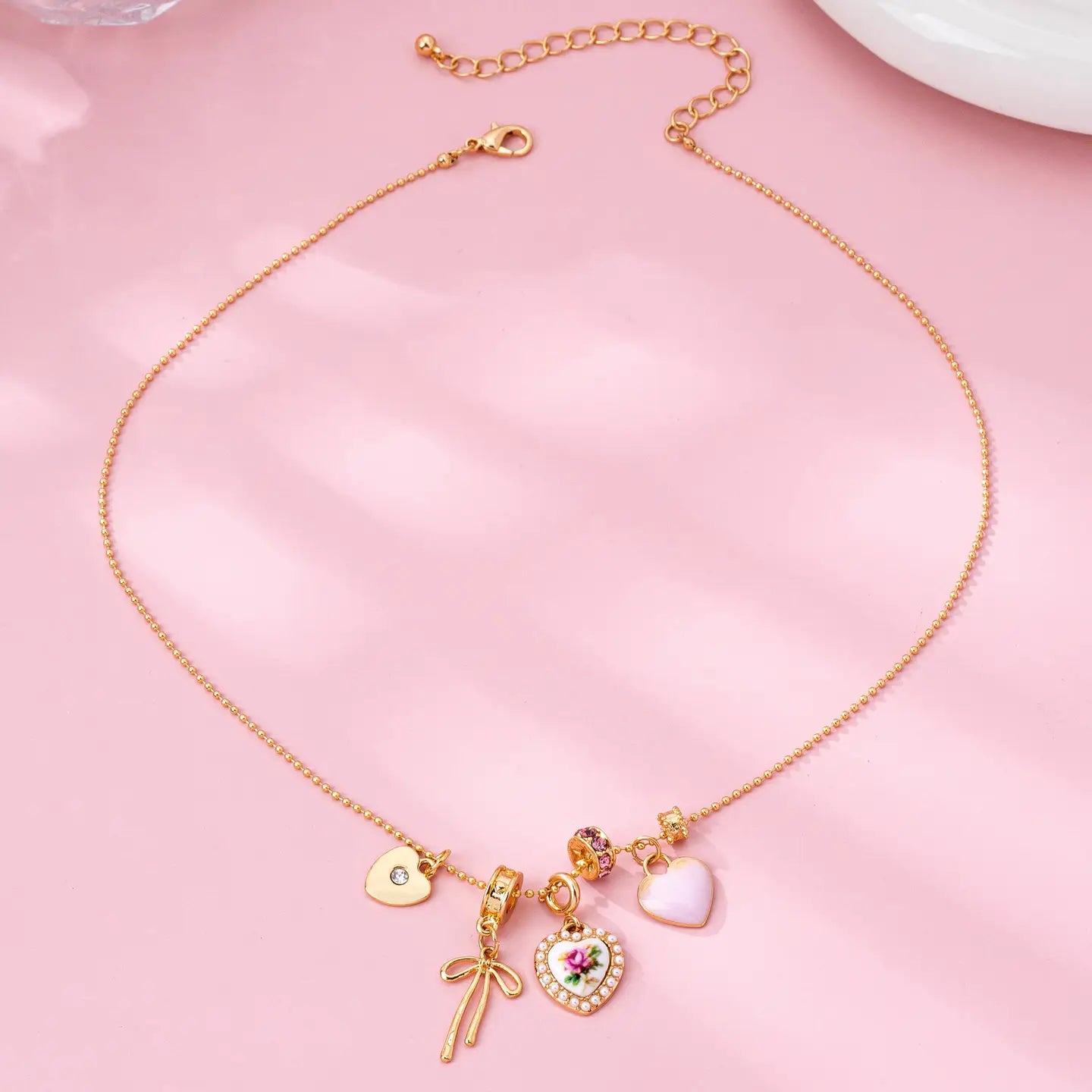 Multi Charm Porcelain Bow Ball Chain Necklace